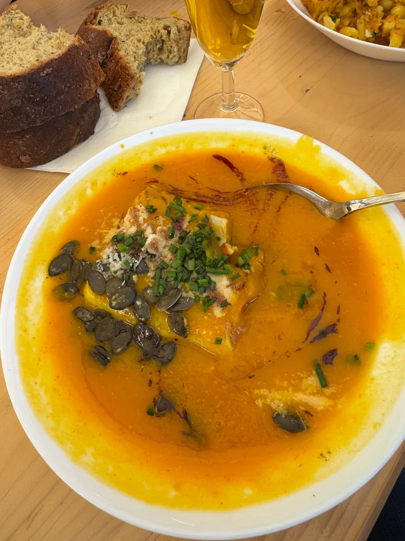 Kürbissuppe — pumpkin soup topped with pumpkin seeds and drizzled with pumpkin seed oil