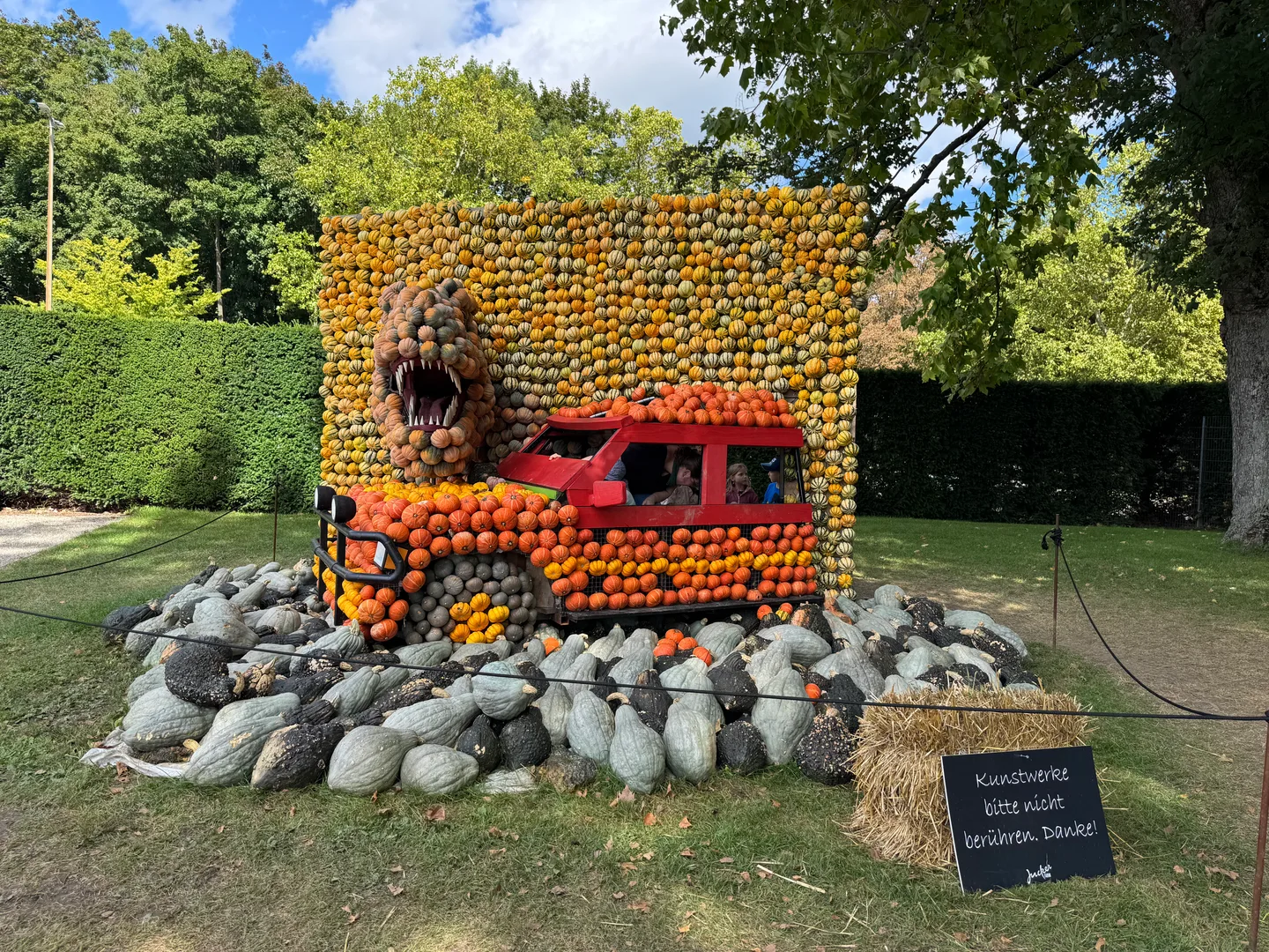 A Jurassic-era car made of pumpkins
